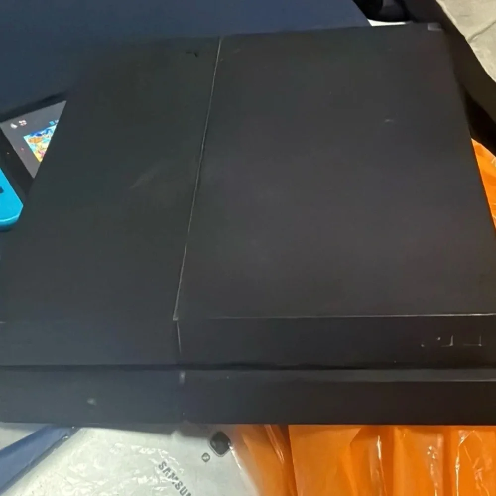 Sony Black Console with DualShock Controller